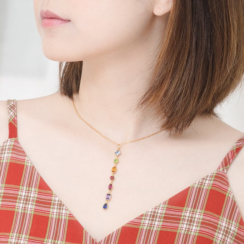 Conjunto de collar con circonitas de colores del arco iris